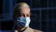 Yulia Navalnaya, wife of Russian opposition leader Alexei Navalny, wears a protective face mask as she leaves after a court hearing in Moscow, Russia February 1, 2021. REUTERS/Evgenia Novozhenina