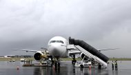 An aircraft carrying South Africa's first coronavirus disease (COVID-19) vaccine doses arrives at OR Tambo airport in Johannesburg, South Africa, in this handout picture taken February 1, 2021. Elmond Jiyane for GCIS/Handout via REUTERS