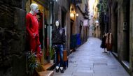 FILE PHOTO: Mannequins are seen on an empty street in Barrio Gotico (Gothic Quarter), after Catalonia's government imposed new restrictions in an effort to control the spread of the coronavirus disease (COVID-19), in Barcelona, Spain January 26, 2021. REU