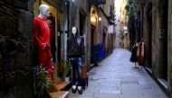 Mannequins are seen on an empty street in Barrio Gotico (Gothic Quarter), after Catalonia's government imposed new restrictions in an effort to control the spread of the coronavirus disease (COVID-19), in Barcelona, Spain January 26, 2021. REUTERS/Nacho D
