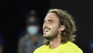 Tennis - Australian Open - Melbourne Park, Melbourne, Australia, February 17, 2021 Greece's Stefanos Tsitsipas celebrates winning his quarter final match against Spain's Rafael Nadal REUTERS/Jaimi Joy
