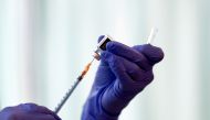 A medical worker fills a syringe with a dose of the Pfizer-BioNTech coronavirus disease (COVID-19) vaccine as Japan launches its inoculation campaign, at Tokyo Medical Center in Tokyo, Japan February 17, 2021. Behrouz Mehri/Pool via REUTERS/File Photo
