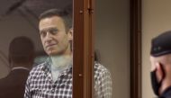 Russian opposition leader Alexei Navalny attends a hearing to consider an appeal against an earlier court decision to change his suspended sentence to a real prison term, in Moscow, Russia February 20, 2021, in this still image taken from video. 