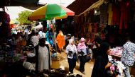 FILE PHOTO: People shop at a bazaar in Khartoum, Sudan, June 24, 2019. REUTERS/Umit Bektas