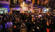 Demonstrators clash with police as supporters of arrested Catalan rapper Pablo Hasel protest in Barcelona, Spain, February 20, 2021. REUTERS/Albert Gea

