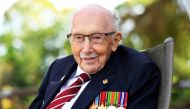 Captain Sir Tom Moore smiles as he launches his autobiography book 'Tomorrow will be a Good Day' at his home in Milton Keynes, Britain September 17, 2020. REUTERS/Dylan Martinez/File Photo