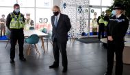 Britain's Prime Minister Boris Johnson visits South Wales Police Headquarters in Bridgend, South Wales, Britain February 17, 2021. Alastair Grant/Pool via REUTERS
