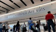 FILE PHOTO: Passengers from international flights arrive at Heathrow Airport, following the outbreak of the coronavirus disease (COVID-19), London, Britain, July 29, 2020. REUTERS/Toby Melville
