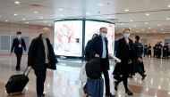 FILE PHOTO: Peter Ben Embarek, and other members of the World Health Organisation (WHO) team tasked with investigating the origins of the coronavirus disease (COVID-19), arrive at the Pudong International Airport in Shanghai, China February 10, 2021. REUT