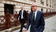 Britain's Chief Medical Officer Chris Whitty and Chief Scientific Adviser Sir Patrick Vallance leave the Foreign and Commonwealth Office (FCO) in London, Britain November 10, 2020. REUTERS/John Sibley/File Photo