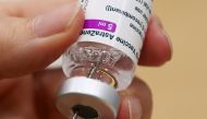 A medical worker prepares a dose of Oxford/AstraZeneca's COVID-19 vaccine at a vaccination centre in Antwerp, Belgium March 18, 2021. REUTERS/Yves Herman
