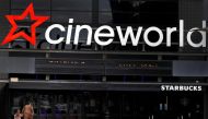 People enter a Cineworld cinema following the outbreak of the coronavirus disease (COVID-19) near Manchester, Britain, October 4, 2020. REUTERS/Phil Noble/File Photo