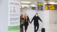 An information placard is pictured as tourists from Germany arrive to Palma de Mallorca airport following Berlin's lifted quarantine requirement for travellers returning from the Balearic islands amid the coronavirus disease (COVID-19) pandemic, Palma de 
