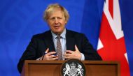 Britain's Prime Minister Boris Johnson holds a news conference on the coronavirus disease (COVID-19) pandemic, in London, Britain March 29, 2021. Hollie Adams/Pool via REUTERS
