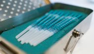 Syringes containing doses of the Pfizer-BioNTech coronavirus disease (COVID-19) vaccine are seen prepared to vaccinate patients at their homes in Cologne, Germany, March 28, 2021. Reuters/Thilo Schmuelgen