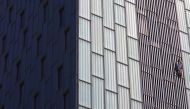 George King, the man who climbed the Shard, climbs the Hotel Melia Barcelona Sky in Barcelona, Spain, April 2, 2021. REUTERS/Nacho Doce
