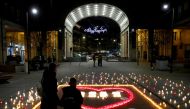 FILE PHOTO: FILE PHOTO: Candles are lit in memory of Hungary's coronavirus disease (COVID-19) victims in Budapest, Hungary, December 21, 2020. REUTERS/Bernadett Szabo/File Photo
