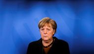 FILE PHOTO: German Chancellor Angela Merkel briefs the media after a virtual meeting with federal state governors at the chancellery in Berlin, Germany, March 30, 2021. Markus Schreiber/Pool via REUTERS/File Photo
