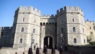 Wardens stand outside Windsor castle, after Britain's Prince Philip, husband of Queen Elizabeth, died at the age of 99, in Windsor, near London, Britain, April 15, 2021. REUTERS/Molly Darlington
