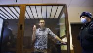FILE PHOTO: Russian opposition leader Alexei Navalny attends a hearing to consider an appeal against an earlier court decision to change his suspended sentence to a real prison term, in Moscow, Russia February 20, 2021. REUTERS/Maxim Shemetov/File Photo
