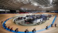 Riders compete in the men's Omnium Scratch Race 1/4 during the Tokyo 2020 Olympics test event for track cycling at the Izu Velodrome in Izu, Shizuoka prefecture, Japan April 25, 2021. REUTERS/Issei Kato