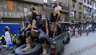 Army soldiers patrol the street, to enforce coronavirus safety protocols, as the spread of the coronavirus disease (COVID-19) continues in Peshawar, Pakistan April 25, 2021. REUTERS/Fayaz Aziz

