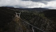 A general view of the world's longest pedestrian suspension bridge '516 Arouca', now open for local residents in Arouca, Portugal, April 29, 2021. Picture taken with a drone. REUTERS/Julio Torres