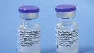 Vials of the Pfizer-BioNTech vaccine are pictured in a vaccination centre in Geneva, Switzerland, February 3, 2021. REUTERS/Denis Balibouse/File Photo