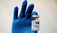 A medical worker holds a bottle of AstraZeneca's COVID-19 vaccine at a vaccination centre in Kuala Lumpur, Malaysia May 5, 2021 in this file photo. REUTERS/Lim Huey Teng/File Photo
