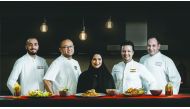 Chefs pose for a photograph during Chefs of Qatar Virtual Food Festival.