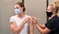 Australian Olympic swimmer Cate Campbell receives the Pfizer coronavirus disease (COVID-19) vaccine at the Queensland Academy of Sport in Brisbane, Australia, May 10, 2021. AAP Image/Dan Peled via REUTERS 