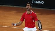 Serbia's Novak Djokovic reacts during his semi final match against Italy's Lorenzo Sonego REUTERS/Guglielmo Mangiapane