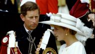 FILE PHOTO: Prince Charles looks towards Princess Diana as they await their carriage to depart the Order of the Garter ceremony at Windsor Castle June 15, 1992. REUTERS/Kevin Lamarque/File Photo
