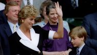FILE PHOTO: The Princess of Wales, accompanied by her son Prince William, arrives at Wimbledon's Centre Court before the start of the Women's Singles final July 2/File Photo
