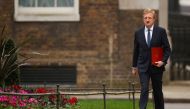 Britain's Secretary of State for Digital, Culture, Media and Sport Oliver Dowden walks outside Downing Street in London, Britain March 3, 2021. REUTERS/John Sibley

