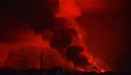 A general view shows smoke and flames at the volcanic eruption of Mount Nyiragongo near Goma, in the Democratic Republic of Congo May 22, 2021. REUTERS/Olivia Acland
