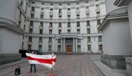 Activists attend a rally in support of Belarusian anti-government movement and detained blogger Roman Protasevich, in front of the Ministry of Foreign affairs in Kyiv, Ukraine May 28, 2021. REUTERS/Gleb Garanich