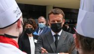 French President Emmanuel Macron talks with hospitality school students in Tain l'Hermitage, Drome department, France June 8, 2021. Philippe Desmazes/REUTERS
