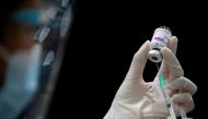 A health worker prepares a dose of AstraZeneca COVID-19 vaccine against the coronavirus disease (COVID-19) as Thailand start mass inoculation at a gymnasium inside Siam Paragon shopping centre, Bangkok, Thailand June 7, 2021. REUTERS/Soe Zeya Tun/File Pho