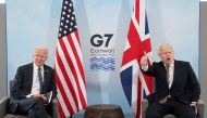 Britain's Prime Minister Boris Johnson gives a thumb up as U.S. President Joe Biden looks on during their meeting, ahead of the G7 summit, at Carbis Bay, Cornwall, Britain June 10, 2021REUTERS/Kevin Lamarque

