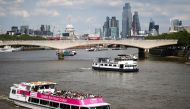 People ride on a sightseeing boat down the River Thames during sunny weather, amid the coronavirus disease (COVID-19) outbreak, in London, Britain, June 5, 2021. REUTERS/Henry Nicholls