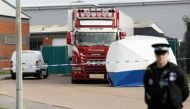 File photo of police team at the scene where bodies were discovered in the back of the truck on an industrial estate to the east of London