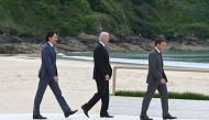 Canada's Prime Minister Justin Trudeau, US President Joe Biden and France's President Emmanuel Macron arrive for the G7 meeting in Carbis Bay, Cornwall, Britain, June 11, 2021. Leon Neal/Pool via Reuters