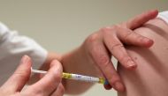 A volunteer receives a dose of CureVac vaccine or a placebo during a study by the German biotech firm CureVac as part of a testing for a new vaccine against the coronavirus disease (COVID-19), in Brussels, Belgium March 2, 2021. Reuters/Yves Herman/File P
