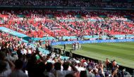 General view as England's Raheem Sterling celebrates scoring their first goal with team mates and fans Pool via REUTERS/Catherine Ivill/File Photo