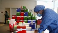 A healthcare worker takes inventory of doses of the Oxford/AstraZeneca coronavirus disease (COVID-19) vaccine, in Buenos Aires, Argentina June 4, 2021. Reuters/Matias Baglietto/File Photo