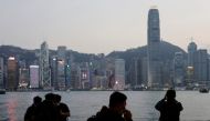 A general view of the Central financial district during sunset, in Hong Kong, China March 11, 2021. REUTERS/Tyrone Siu
