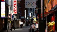 A banner hangs with the Olympic Rings in preparation for the Games that have been postponed due to the coronavirus disease (COVID-19) pandemic at a street in TOKYO, Japan June 27, 2021. REUTERS/Fabrizio Bensch
