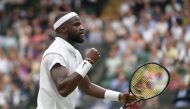 Tennis - Wimbledon - All England Lawn Tennis and Croquet Club, London, Britain - June 28, 2021 Frances Tiafoe of the U.S. celebrates during his first round match against Greece's Stefanos Tsitsipas REUTERS/Toby Melville
