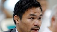 FILE PHOTO: Philippine Senator and boxer Manny Pacquiao speaks during the Congressional confirmation hearing of Environment Secretary Regina Lopez at the Senate in Manila, Philippines May 2, 2017. REUTERS/Erik De Castro